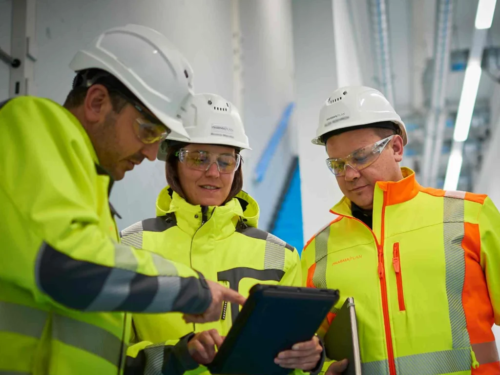 Workers ensuring safety measures at a construction site